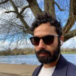 Kunal Nayyar Instagram - This was taken some days ago during a meditative walk through Hyde park. A little update from London, I’ve been away from my family and shooting here, and we are all now desperate to be reunited. Today we paused production so we could all get back to our respective homes. Back in LA tomorrow. I am taking all measures to protect myself and others while I travel. Starting tomorrow I will be isolated at home, and will plan to chat with you all via Instagram live everyday! I’ll tell jokes, show you how I keep my beard moisturized, and also discuss some spiritual tips that can help understand or accept these challenging times. I believe in humanity as a whole, And I am here for you...