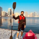 Kunchacko Boban Instagram - When the Kuttanadukaran in you cannot resist the sight of water,canoe and a paddle even if you go out for a morning jog!! #sharjahdiaries #canoe 🛶 #morningsolace