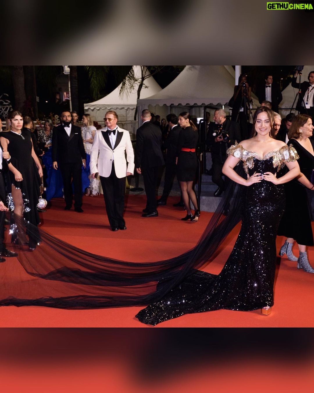 Kusha Kapila Instagram - my first red carpet and movie screening at #Cannes2023 ⭐️✨ @rahulmishra_7 dressed me for this starry moment in a custom off shoulder number. It had me at the neckline - golden poppy flowers and two goldfish kissing bang in the middle. Mermaid-like silhouette, Rahul went for old world glamour and I was here for it. @ayeshaaminnigam really outdid herself with this one. I am glad we share this moment, Ayesh 💜 thank you @rhiakapoor for kindly holding my trail and placing it so beautifully on the carpet. thank you @drsheths for making this moment happen🫶 Most of all, @fetch_india for making this dream come true. Styled by : @ayeshaaminnigam @rhiakapoor Assisted by: @sejal_satish.n @thanishqkokare Gown @rahulmishra_7 Jewels: @damianiofficial Shoes: @hausofhoneyclub Makeup : @aashna_shah Hair : @makeupbyvishakha Cannes, French Riviera, France