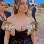 Kusha Kapila Instagram - my first red carpet and movie screening at #Cannes2023 ⭐️✨ @rahulmishra_7 dressed me for this starry moment in a custom off shoulder number. It had me at the neckline - golden poppy flowers and two goldfish kissing bang in the middle. Mermaid-like silhouette, Rahul went for old world glamour and I was here for it. @ayeshaaminnigam really outdid herself with this one. I am glad we share this moment, Ayesh 💜 thank you @rhiakapoor for kindly holding my trail and placing it so beautifully on the carpet. thank you @drsheths for making this moment happen🫶 Most of all, @fetch_india for making this dream come true. Styled by : @ayeshaaminnigam @rhiakapoor Assisted by: @sejal_satish.n @thanishqkokare Gown @rahulmishra_7 Jewels: @damianiofficial Shoes: @hausofhoneyclub Makeup : @aashna_shah Hair : @makeupbyvishakha Cannes, French Riviera, France