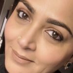 Kushboo Instagram - In the depth of darkness, a gentle smile reflects a world of contentment and love..🩶🩶🩶