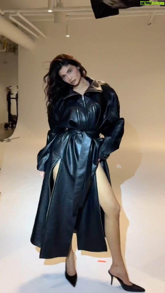 Kylie Jenner Instagram - the faux leather trench. back in stock on khy.com @khy