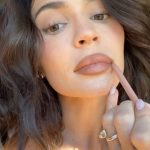 Kylie Jenner Instagram - @kyliecosmetics here’s my favorite new juicy lip combo 💦 🤍 Precision Pout Lip Liner shade ‘Cinnamon’ 🤍 Tinted Butter Balm shade ‘Love That 4 U’ 🤍 Gloss Drip shade ‘Playfully Pink’