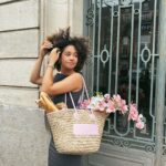 Léna Mahfouf Instagram – la Mère de Paris est de retour dans ses quartiers. J’ai déjà mes looks printaniers @claudiepierlot et mes petits paniers, la moindre des choses aurait été de m’accueillir avec le soleil. 🥐🎀 

collaboration commerciale 
photographie retouchée Paris, France