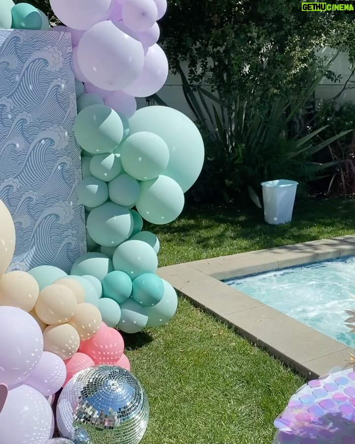 Lala Kent Instagram - I’m still dying over Ocean’s birthday party. I’ve gotten A LOT of messages asking about everything. So here are some pictures and you can find the contacts below 🤍🌊🥳 Photography: @jessicaczarneckicreative Party planners: @picnic_and_petal @glitzandgather Table setting + styling: @picnic_and_petal Balloon installation + styling: @glitzandgather Florist: @lovestruckblooms Acrylic goods: @atomickraftworks Graphic design: @winkandinkpaperie Custom backdrops: @trudesign.contracting Party supplies: @paperandparties Custom party hats + wands: @winnieandhaze Table linens: @cvlinens Custom neon sign: @sketchandetch.neon Cake: @thegateauxshoppe_ Custom macarons + macaron tower: @boymama_bakes Custom sugar cookies: @megans.bakes Candy tray and personalized pouches: @madesweet_byamanda Soft play: @modernkidsplaycompany Mini bounce house: @minicastlesco Custom shirts: @freshbakedteesprintshop Custom bathing suits + trucker hats: @sunnyboutiquemiami Custom Visors + cups: @bubblyandbash Custom sunglasses: @estherbrophoenix Custom air fresheners: @dangle_it Custom can coolers: @carolinacancoolers Custom tissue paper + stickers: @coacousa Custom crayons: @thecrayonclique Custom coloring books: @munchkinlanellc Seashell towels: @shopthemagicbox Coolers: @revocoolers Sparkling water: @sanpellegrino_us @perrierusa Wine: @avaline Venue: @mrjaxtaylor @brittany @littlebabycauchi house