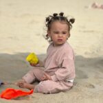Lala Kent Instagram - A little “Ocean goes to Newport” carousel. Made my heart so full watching O play where I used to play at her age. Newport holds a special place in my heart. My dad would have us set up on this beach at 7 am & we’d stay until the sun went down. Ocean is making him proud. A beach bum just like her Poppy 🌊