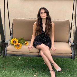 Laura Marano Instagram - This swing is actually broken, but it looks adorable in photos

🌻🌻🌻🌻🌻🌻🌻🌻🌻🌻🌻

Hair: @hairbyeleven 
Makeup: #hmubymelbe 
Stylist: @elizayerry 
Dress @bcbgmaxazria 
Rings @grazielagems 
Shoes @mia_becar