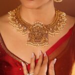 Lavanya Tripathi Instagram - Having been born in Ayodhya, the divine residence of Lord Rama, I feel incredibly lucky to witness this auspicious occasion. It is a moment of great pride for me and all fellow bharatvasi ( citizens of india) as we witness the Pran-Pratishta of Lord Sri Ram. Wearing the Ram parivar jewelry adds a personal touch to this joyous occasion. This Pran-Pratishta ceremony not only holds significance for Ayodhya but for the entire nation. It is a time when the nation as a whole comes together to celebrate and rejoice in the divine presence of Lord Rama. It is a moment that unifies us all, May it foster a sense of unity among all its citizens and strengthen the bonds that hold our diverse country together. With Jai Shri Ram on our lips and hearts filled with devotion, let us pray for peace, understanding, and goodwill to prevail in Ayodhya and throughout India. Jai Shri Ram! 🙏 #ayodhyarammandir🚩 #ayodhya #rammandir Thank you @anithareddy_curate & @tritikshajewels for curating this look for me. 📸- @pranav.foto