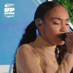 Leigh-Anne Pinnock Instagram – The smile on my face says it all 😍 My first ever solo performance in the company of my legion, I’m still lost for words 💚 being back on stage just felt like home! Thank you to everyone that came to support me and  thank you to @capitalofficial for making this happen 🥰 
📸: Matt Crossick 
Hair: @momoshair 
Make-up: @hilakarmand 
Styling: @justinplz 
Nails: @stephie_nails 
Guitarist: @thisismafro 
Backing vocalists: @maleik.wav + @purpleberryjo