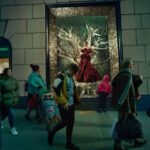 Lena Dunham Instagram - This year I took my husband to see the windows at Bergdorf Goodman. His first time and he was giddy like a little kid. I’ve loved those windows since I was a child- the same way I loved the dioramas at the Natural History Museum, or lockets or snow globes. A discreet world, a moment in time, frozen and infinitely revisited. When I was 27 I was on the cover of Vogue. This didn’t seem like a natural place for me to land- I had never felt like a “cover girl” or really any kind of girl, more like an old lady. When one of my PR people said “the first of many!” I corrected her. “Probably this will only happen once- I realize I’ve struck a very specific moment. And someday I’ll be 99 and my cool young neighbor will come to my apartment to help me carry my laundry and I’ll offer her tea and show her the crinkled up Vogue cover that I keep in a plastic dust sleeve and she’ll be like ‘that’s you?’ And I’ll say ‘it was lifetimes ago.’” This was the last image Annie Liebowitz shot of me for Vogue (it was freezing and this @zacposen dress required several people to lower me in and out on a sort of wood plank!) They didn’t end up publishing it but it’s in Annie’s new book Wonderland. Watching her work was incredible- I noticed she held her camera at an angle I’d never seen before, slightly off. Like the Bergdorf windows at Christmas this image is a slice of time, a moment I can return to with some disbelief. Before so much. Standing in the window, seemingly oblivious to the passers by but really wondering “what are they thinking?” What are any of us thinking?