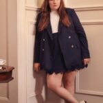 Lena Dunham Instagram - I've always been a fluctuator, but it wasn't until I got into my thirties and had a hysterectomy that I started to really settle into my adult body and- spoiler alert- she wasn't a size 4. Gone were the days I could keep a pair of too-small jeans then decide to subsist on coffee for six days in order to get them back on, and gone were the days that I wanted to. Instead, I yearned to find some peace and sustainability in my body. I valued my mental and physical health over an outdated image of how I thought I'd look at this age (Holly Golightly meets Courtney Love) or numbers on a scale (haven't weighed myself in several years, turn around when they do it at the doctor, broke up with that metric when it became a ceaseless brain worm.) But once I was firmly in my plus-sized body, I started to look around at the fashion landscape and realized that the perceptions of bigger bodies- that we want to dress like grandmas, rockabilly chicks or club divas- are whack as hell. In truth there are as many variations of plus-sized girls as there are straight-sized girls. We want what you want, and we want it how you want it. My goal with these looks for @11honore was that they would have the energy of the artist women I grew up around in downtown New York, free thinkers who leaned into masculine suiting but also loved to play with feminine shapes, who made their way from the studio to the flower market on 14th street to pick up their kids, then out to the Public Theater and need to layer and function. But those vintage-inspired looks tend to exist in slim cuts for waifs, and I don't want any plus woman to wonder if she'll fit into these clothes. I know that I for one never want to pray as I pull up a pair of jeans again- what a useless thing to pray about. I'm so excited for these @11honore styles to finally be available to shop online, and can't wait to see you in them. Please, for the love of a God greater than I, tag us and show us how you're wearing the pieces, tell me how they make you feel, and tell me about your journey with fashion and your body. I'm listening. Link in bio. #11HxLD