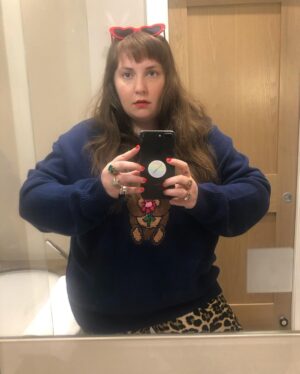 Lena Dunham Instagram - Recently I came across this photo of me at 24. I could remember exactly where I was when it was taken- the bathroom of a bar in the dead heat of August, wearing a vintage dress of my mother's, with this overwhelming feeling (the kind you only get when you're young) that you’re on the precipice of some big change. It got me dreaming about what that girl would have thought if I could appear in that mirror and tell her what the next 10 years would hold. "Hello, it's me, 34 year old Lena. You're not gonna believe this but in, like, 2 months you're going to start on six seasons of a TV show. Are people gonna like it? That's a... complex question, but you will love making it, and you will learn exactly what your own voice sounds like. Oh, and you're going to write books. Like, WHOLE books. And yes, you will fully move out of your parents house and all the way to freakin' California- don't worry, I know it's Hollywood but you won't have to lose weight, in fact you'll gain it- and sometimes even to the UK. And yes, you have a million friends and collaborators you love and you aren't lonely in the ways you are now. Which is good because yeah, you know those random stomach aches? There's, like, a bunch of surgery coming. They're going to take out your uterus, which I know sounds kinda random but trust me, it's a bigger deal once you're older. And then you'll have to get sober. But you don't have a drug problem? Oh, please hold for that. And by the time you're my age you'll have kissed approximately 47 men (you still keep a list!) and literally none of them will be your husband. And you STILL can't fucking drive. But you know the weird part? It's all okay. It's better than okay. It's exactly what you were hoping for when you went into the bathroom and held this brand new thing called an iPhone up to the mirror thinking 'something great is coming.'"