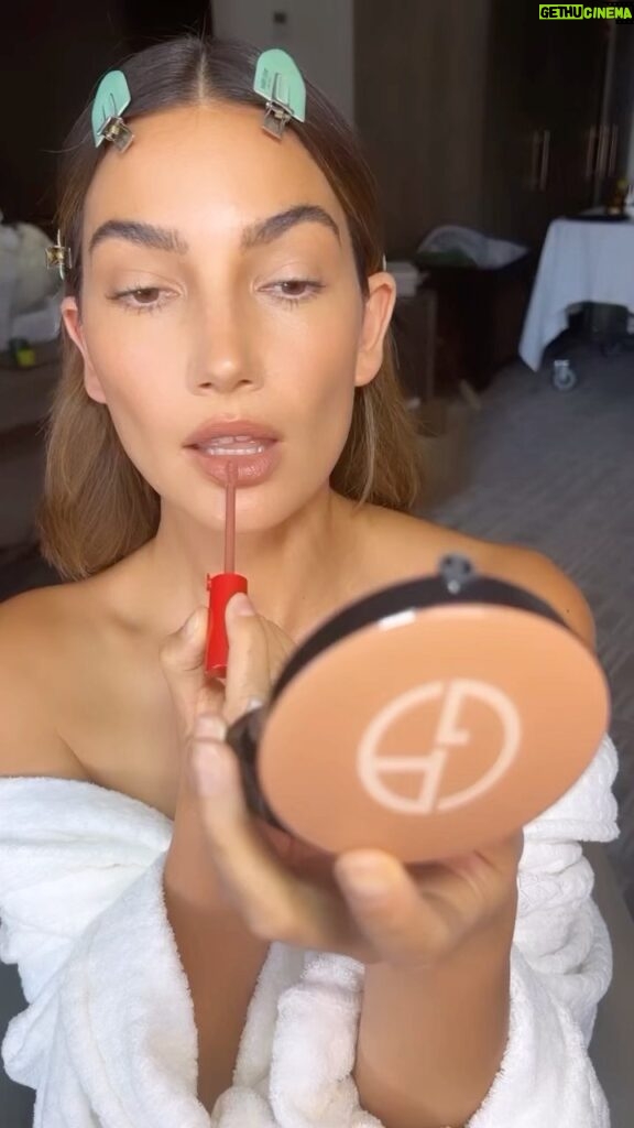 Lily Aldridge Instagram - Finishing Touches 💋 NYFW Makeup by @cgonzalezbeauty using @armanibeauty Hair by @jacobrozenberg using @harryjoshprotools And gorgeous Facial @fabricioormonde