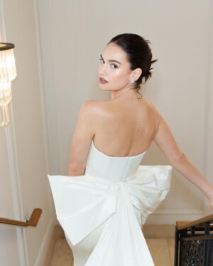Lily James Instagram - Couture @tamararalph . White satin never felt so good. Thank you so much for allowing me to wear this unbelievably beautiful gown. Along with 
@bulgari @onlynaturaldiamonds 🤍xxxxx
@pipbourdillon you beaut behind the 📷