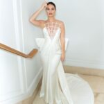 Lily James Instagram - Couture @tamararalph . White satin never felt so good. Thank you so much for allowing me to wear this unbelievably beautiful gown. Along with @bulgari @onlynaturaldiamonds 🤍xxxxx @pipbourdillon you beaut behind the 📷