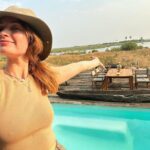 Lily James Instagram - Once in a lifetime. Thank you @greatplainsconservation for an unbelievable safari experience. Can’t wait to share the rest of my journey through Botswana @onlynaturaldiamonds @onlynaturaldiamonds_in @onlynaturaldiamonds_ae #conservationtourism #safarimoments And thank you Greg @safarifootprints 🫶🏻 Botswana Africa