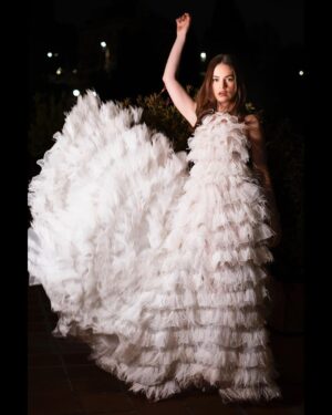 Lily James Instagram - Magical time in Rome with Finalmente l’Alba. 🇮🇹
Thank you so much @maisonvalentino for the most stunning gown for the premiere 🤍
Photos in the dark in Rome in Valentino by @clementina.dirobilant were captured in minutes before rushing to the film. Grazie millie!