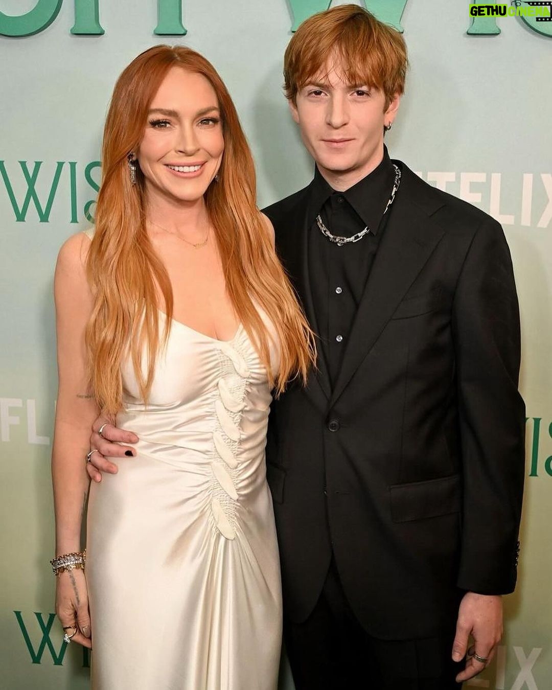 Lindsay Lohan Instagram - So grateful for all of the love and support ☘️🥰 Makeup: @kristopherbuckle Hair: @daniellepriano Styling: @marielhaenn #randm @robzangardi Nails: @enamelle Photography: @iam_newyorkmade Dress: Archive @jgalliano Shoes: @casadeiofficial Coat: @sentaler Earrings: @worldofreza Bag: @huntingseasonnyc Bracelets: @hoorsenbuhs @vraiofficial #netflix #netflixfilm #irishwish
