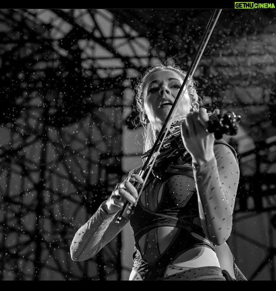 Lindsey Stirling Instagram - Performing in the rain made for some cool shots by @3bears_and_acat