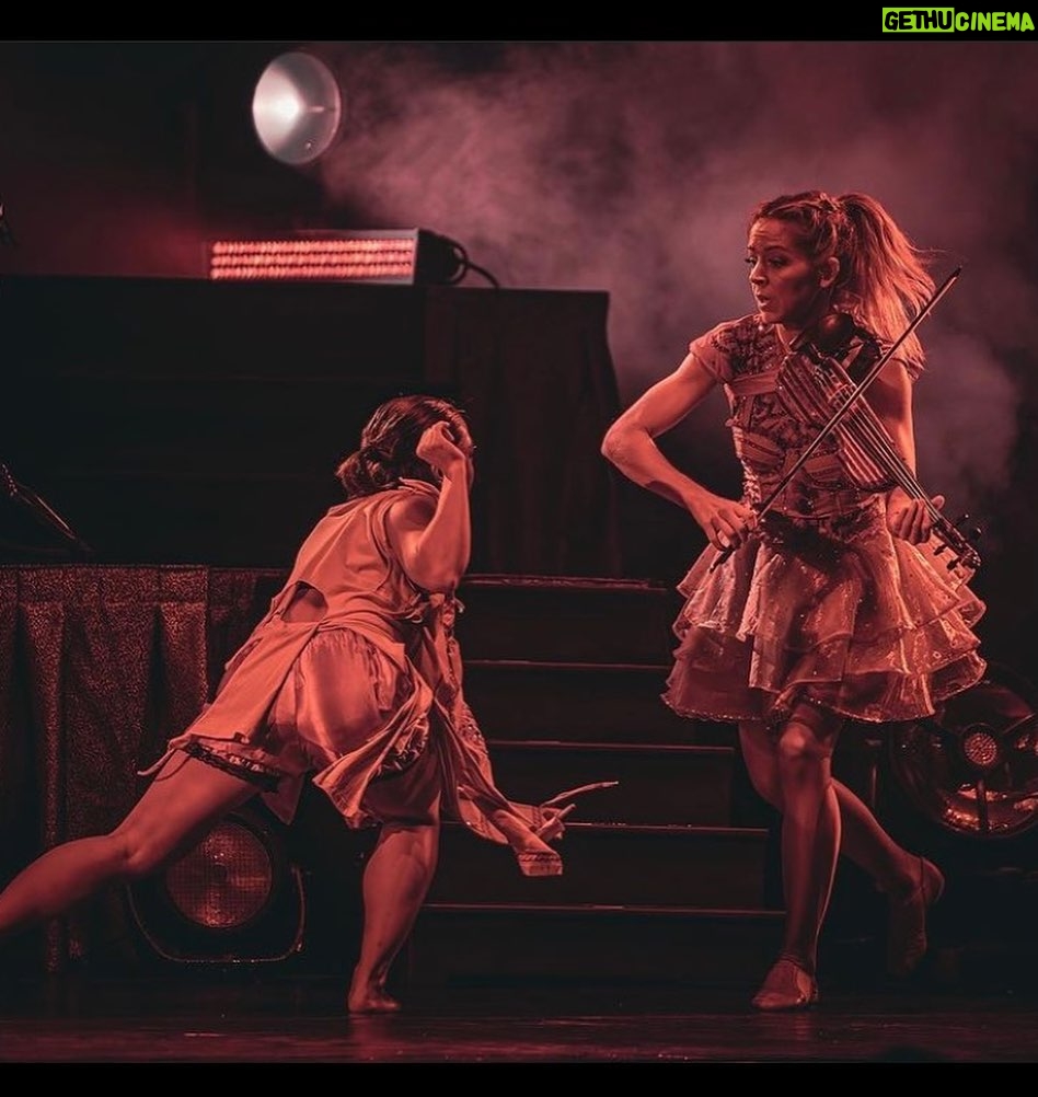 Lindsey Stirling Instagram - Performing in the rain made for some cool shots by @3bears_and_acat