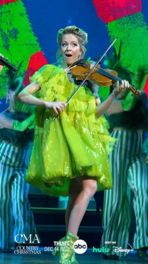 Lindsey Stirling Instagram - We think the Grinch’s heart would grow three sizes after watching that performance by @AshleyMcBryde and @LindseyStirling on #CMAchristmas! 💚💚💚