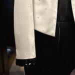 Lionel Richie Instagram - The little details about the big picture…✨ Custom designed satin tailcoat by @davethomasstyle with black @swarovski hand beading on collar and cuffs and an explosion of crystals cascading from the shoulders. - Thanks Dave 🤩