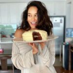 Lisa Haydon Instagram – Swipe 👉 for how we feel about staying home.. don’t mind my poor carribean accent @shabin67 and yes I’ve become a baker… 10 wks now. pasting the recipe below 😋 #stayathome

Red Velvet Cake 
3 cups flour
1 teaspoon baking soda
2 Tablespoons unsweetened natural cocoa powder
1/2 teaspoon salt
1/2 cup butter, softened to room temperature
2 cups castor sugar
1 cup vegetable oil (not olive) 
4 large eggs, separated
1 Tablespoon vanilla extract
1 teaspoon white vinegar
liquid or gel red food coloring
1 cup buttermilk 
Cream Cheese Frosting
400 grams cream cheese 
1/2 cup butter, at room temperature
3 cups icing sugar
1 Tablespoon cream or milk
1 and 1/2 teaspoons pure vanilla extract

Instructions
Preheat oven to 350°F (177°C). Grease two 8 inch cake pans. I only had one pan .. so I baked the cakes one at a time. 
Make the cake: Whisk the flour, baking soda, cocoa powder, and salt together in a large bowl. Put aside.

With a handheld mixer or whisk, beat the butter and sugar together on medium-high speed until combined. Add in the oil, egg yolks, vanilla extract, and vinegar and beat on high for 2 minutes. (Set the egg whites aside.)
Add the dry ingredients in 2-3 parts alternating with the buttermilk. Add in the food colouring (however red you like) until combined (today I had none, fret not, this doesn’t change the cake taste. Whisk the 4 egg whites till foamy/firm. fold into cake batter. 
Divide batter between 2 cake pans. I only had one pan so I baked them one at a time. Bake for 30-40 mins. careful not to overbake as the cakes may dry out. Remove cakes from the oven and cool. The cakes must cool before frosting. Blend all frost ingredients together. Then slice the tops of the cakes off to make them flat. Frost cake one. Stack the 2nd and frost also. Refrigerate for 1hr & enjoyyy 🐷. This cake tastes even better a day later.