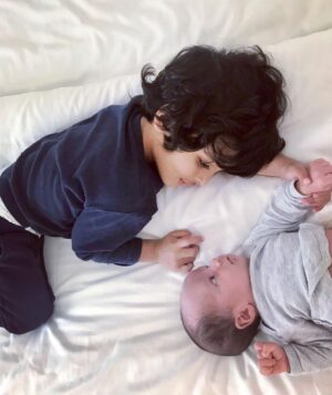 Lisa Haydon Instagram - This little blessing has touched my heart in a way nothing else ever has. Been totally speechless and in love watching you both and can’t believe I get to be your mama. ‘Leo & Zack’ #Brothers
And my forever valentine— Yesterday was our 5 year anniversary of the day we met, on Feb 13th one freaky Friday, life has never been the same since. Thank you for building family with me. 
#HeartRevolution 💙💙💙🧡