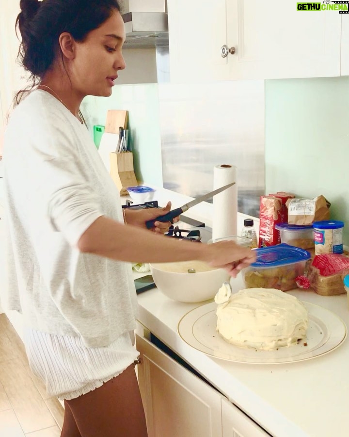 Lisa Haydon Instagram - Swipe 👉 for how we feel about staying home.. don’t mind my poor carribean accent @shabin67 and yes I’ve become a baker... 10 wks now. pasting the recipe below 😋 #stayathome Red Velvet Cake 3 cups flour 1 teaspoon baking soda 2 Tablespoons unsweetened natural cocoa powder 1/2 teaspoon salt 1/2 cup butter, softened to room temperature 2 cups castor sugar 1 cup vegetable oil (not olive) 4 large eggs, separated 1 Tablespoon vanilla extract 1 teaspoon white vinegar liquid or gel red food coloring 1 cup buttermilk Cream Cheese Frosting 400 grams cream cheese 1/2 cup butter, at room temperature 3 cups icing sugar 1 Tablespoon cream or milk 1 and 1/2 teaspoons pure vanilla extract Instructions Preheat oven to 350°F (177°C). Grease two 8 inch cake pans. I only had one pan .. so I baked the cakes one at a time. Make the cake: Whisk the flour, baking soda, cocoa powder, and salt together in a large bowl. Put aside. With a handheld mixer or whisk, beat the butter and sugar together on medium-high speed until combined. Add in the oil, egg yolks, vanilla extract, and vinegar and beat on high for 2 minutes. (Set the egg whites aside.) Add the dry ingredients in 2-3 parts alternating with the buttermilk. Add in the food colouring (however red you like) until combined (today I had none, fret not, this doesn’t change the cake taste. Whisk the 4 egg whites till foamy/firm. fold into cake batter. Divide batter between 2 cake pans. I only had one pan so I baked them one at a time. Bake for 30-40 mins. careful not to overbake as the cakes may dry out. Remove cakes from the oven and cool. The cakes must cool before frosting. Blend all frost ingredients together. Then slice the tops of the cakes off to make them flat. Frost cake one. Stack the 2nd and frost also. Refrigerate for 1hr & enjoyyy 🐷. This cake tastes even better a day later.