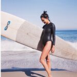 Lisa Haydon Instagram - Baby waves with my baby bump💙 I was gonna post this as my “coming out” pic. But i thought the joy of another addition to our family belonged to all three of us so that’s what was posted instead. Here is a throwback to being #16weeks pregnant with #2. I wrote this a few weeks ago in answer to lots of questions about exercise when preg and nausea .. since writing this post I haven’t done any exercise 😱or even gone for a walk😱. Lots has been eaten though 🐽🐽🐽 and our baby is so far, so good 😊 and that’s all that matters. This first trimester was rough. Nothing like my first pregnancy... surfing was something I had been doing from before and was disappointed at the thought of having to stop. I checked with my doctor who surprisingly approved and said one should carry on as usual. Of course, with precautions. I tried doing other forms of excersize but, All other excersize would make me feel worse - this was practically my only release (and sucking on a Lemon🍋) to feel better from the intense nausea and also get an adrenaline kick- I mean, it’s a high😛. After doing loads of googling on the subject, I found multiple articles on surfing when pregnant.. and was relieved to know I’m not the only one. Positive, I haven’t got many, if any, pregnant surfers following me , but if I do:-) here’s what I learned and followed. 1.) surf on a foam board (unless modelling for first baby photo. Then pose with hard board;-) ) , 2.) try and paddle on your knees ... I actually felt nothing when paddling on my stomach, so I did. 3.) don’t go out in crazy surf. 4.) listen to your body and to your doctor. This morning I took a moment to appreciate how much better life is feeling moving on from trimester one... another high. Week 16 was my cutoff to stop and so, Until next year baby waves 🌊💞✌️