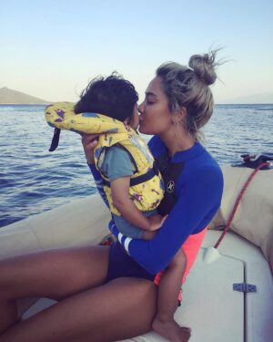 Lisa Haydon Instagram - My little one way ticket to Neverland. We basically like all the same things... Mary Poppins, chocolate, roller coasters, carousels, being spoon fed, riding scooters, feeding ducks- feedin anything that will eat our old crusty bread, 🐿 cooking, sleeping all day,  staying up all night😳 ..things are a mess sometimes. But only adults notice that stuff🙄😋... that saying, ‘Don’t grow up, it’s a trap!’ - Its true. 
One last thing- Superkalafrajelisticexpialidosious.. that’s all👋 #happychildrensday to all the big and little children out there
