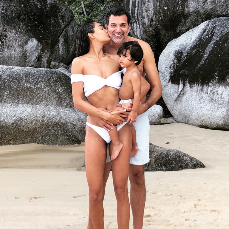 Lisa Haydon Instagram - Two years ago on this spot of beach we said yes to a whole new life. Thank you for making me a much better .... tennis player(what doesn’t kill you makes you stronger😆). You have truly taught me what it means to be.... a Gypsy.. and You are hands down the worlds best... Instagram photographer. Jokes aside, happy anniversary, best dad, tech visionary and always full of surprises— out there acing life! We Love YOU xx p.s. Zack is a happy kid I promise. This picture nutshells how he feels about family photos where his parents struggle to look good while he nails blue steel in every shot 🙄