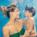 Lisa Haydon Instagram - Every Thursday we have swimming class.. our favourite day of the week. Last week all the kids took underwater photos with their mummies. This was ours. 📸 by @elaunderwater