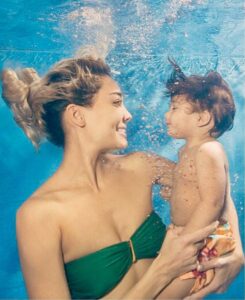 Lisa Haydon Instagram - Every Thursday we have swimming class.. our favourite day of the week. Last week all the kids took underwater photos with their mummies. This was ours. 📸 by @elaunderwater