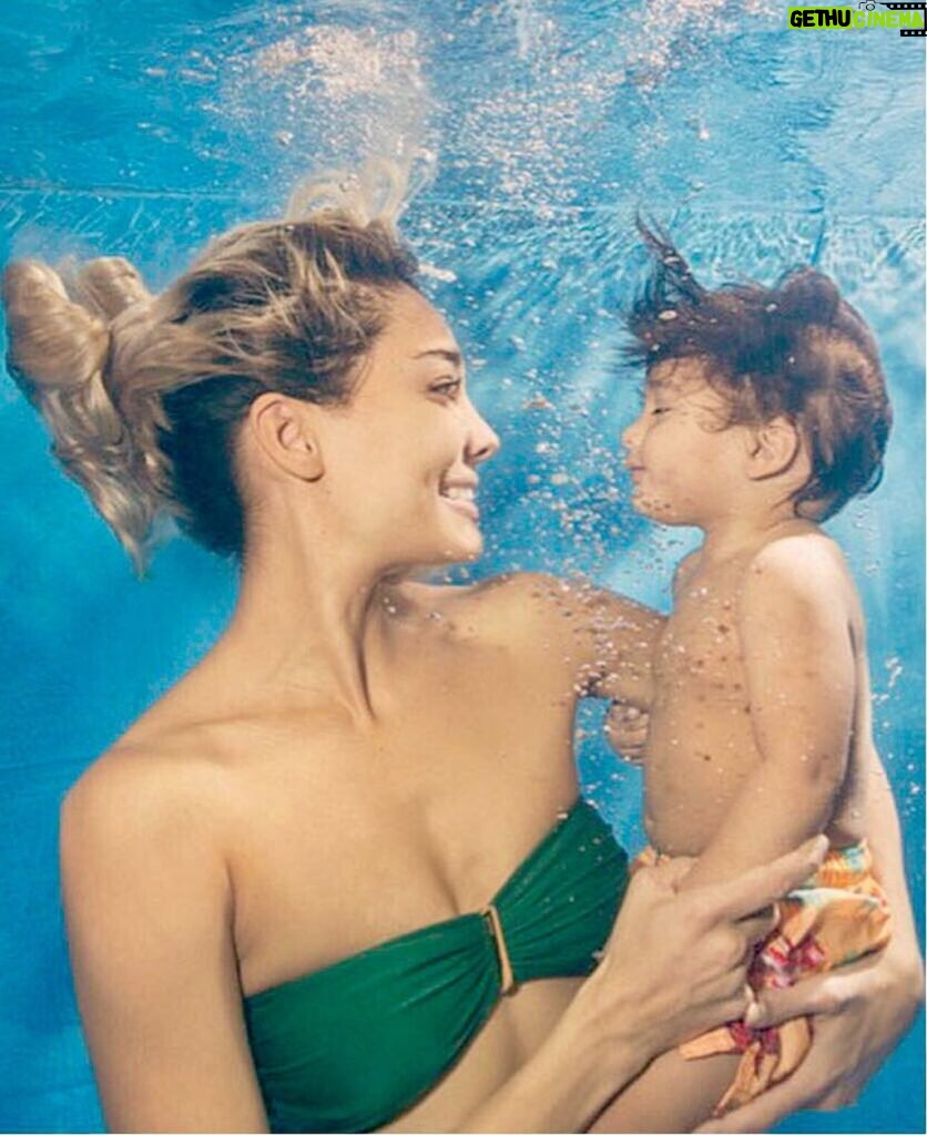 Lisa Haydon Instagram - Every Thursday we have swimming class.. our favourite day of the week. Last week all the kids took underwater photos with their mummies. This was ours. 📸 by @elaunderwater