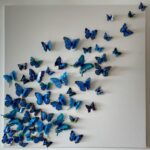 Lisa Haydon Instagram - Zack made this artwork this morning with butterflies we bought on Amazon with stickers at the back.