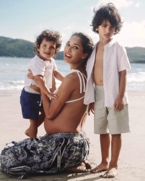 Lisa Haydon Instagram - So proud of this little moment with allll my babies 🥰. We shot this photo first and this was the only five mins they both kept still and looked at the camera. Thank God for small mercies 😅Thank you team @bazaarindia for your friendship and support through EVERY phase of life. And to the amazing team that pulled this off here in HK! Tap for tags 🏷 

Digital editor: @nandinibhalla 
Photographer: @rubylaw 
Make up : @omix 
Hair : @peter_cheng_hair 
Styling : @justinelee425 
Production : @marinafairfax 
Photographer assist : @kehocheung 

Swipe 👉 for the shot that didn’t make the cover but I also love. What do you think?