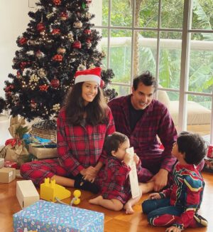 Lisa Haydon Instagram - Hope everyone had a verrryy Merry Christmas... missed my family this year but so grateful for friends like family (@simmigm @kathykwei @alisonelazar @karimelazar888 )that made our Christmas so fun and cozy.  I have about 300 imperfect photos this Christmas 😅 tried so hard but this was the best we managed. Zack crying to have to keep still, Leo chewing on whatever wrappings he can find ... oh well, we happy, not perfect 🤷‍♀️💕❤️