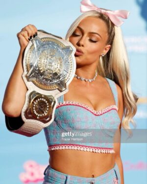 Gionna Daddio Instagram - This Barbie is a WWE Champion ✨💞

Thank you for having me @wbpictures @mattel 🖤🙏 

& Thank you to the very best glam squad a Barbie could ask for 🥹 

Styled by: @kingtroi 
Hair: @hayleyheckmann 
Makeup: @erosmua 
Tan: @isabelalysa