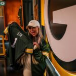 Liv Morgan Instagram – @wwe Superstar @yaonlylivvonce is here! Liv Morgan took a tour of @lambeaufield & surprised @showtyme_33 with a #Packers WWE Legacy Title Belt. 🏆 #GoPackGo Lambeau Field