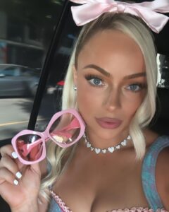 Liv Morgan Instagram - This Barbie is a WWE Champion ✨💞 Thank you for having me @wbpictures @mattel 🖤🙏 & Thank you to the very best glam squad a Barbie could ask for 🥹 Styled by: @kingtroi Hair: @hayleyheckmann Makeup: @erosmua Tan: @isabelalysa Los Angeles, California