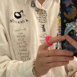 Lizzy Greene Instagram - 👛this is my moms shirt from the 80s🐈🐈‍⬛