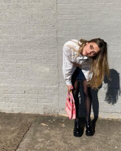 Lizzy Greene Instagram - 👛this is my moms shirt from the 80s🐈🐈‍⬛