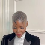 Lupita Nyong'o Instagram - Tonys BTS with the team! For big nights and small ones too, I love the little details as commemorations to take in and appreciate life experiences. I’m so grateful for the collaborators who brought their individual talents to make a collective statement on Tonys Night. We made the day a big party to celebrate our dear Saheem and theater’s ability to bring people together in shared spaces, to think, feel, learn, laugh, wonder and love! Here’s to THAT! ❤️ 🎭 1: The squad! 🙏🏿 2: @nickbarose who brings an endlessly inspired hand to eyes, lips, face, and cheeks! 💄 3: The birthday girl and stylist, @micaela, who Fairy Godmother to both me and @saheemscene on his big night. 🧁🌟 4: Jewelry by @debeersofficial RVL Collection. Complimentary manicure by @sonyameesh 🩶🩶 5: @mishajapanwala! Y’all know who she is now! 🎽🩻 🙌🏿 6: Henna head art by @hennabysabeen with clean shave by @mrbarberj. Keep scrolling to read about Sabeen’s homage to East African and South Asian cultures in her design. 🌍🌏 7: Our Tony nominee and Our Plus-Ones: @saheemscene! @dedeayitedesign @michaelthurber ❤️❤️❤️ 8: A Saheem Photo Cake! Courtesy of @creeinnyc! 🍰 🖌️HENNA ART INSPIRATION: We had the words sculptural, sharp & solid as our guides to compliment Misha's work. And then I visited the Kenyan artist, Wangechi Mutu's exhibition entitled INTERTWINED, and it all solidified for us! Wangechi, like Misha interrogates the representation of the female body, and in her piece, In Two Canoe the human body morphs into the plant body, exploring a fantastical hybridity that alludes to "the fertility, femininity and symbiosis captured in the object's very doubled form." So, we went with a leaves motif because of their ability to be both geometric and organic. They grow within the bounds of a very elaborate system and are still able to improvise to INSIST on their survival and growth, and that's exactly what I am keen to do in this season of my life. There's also a quiet homage to the kofia/kufi worn in both our East African and South Asian cultures as well as it being a symbol of African-American pride - a salute to our new homeland! ‌