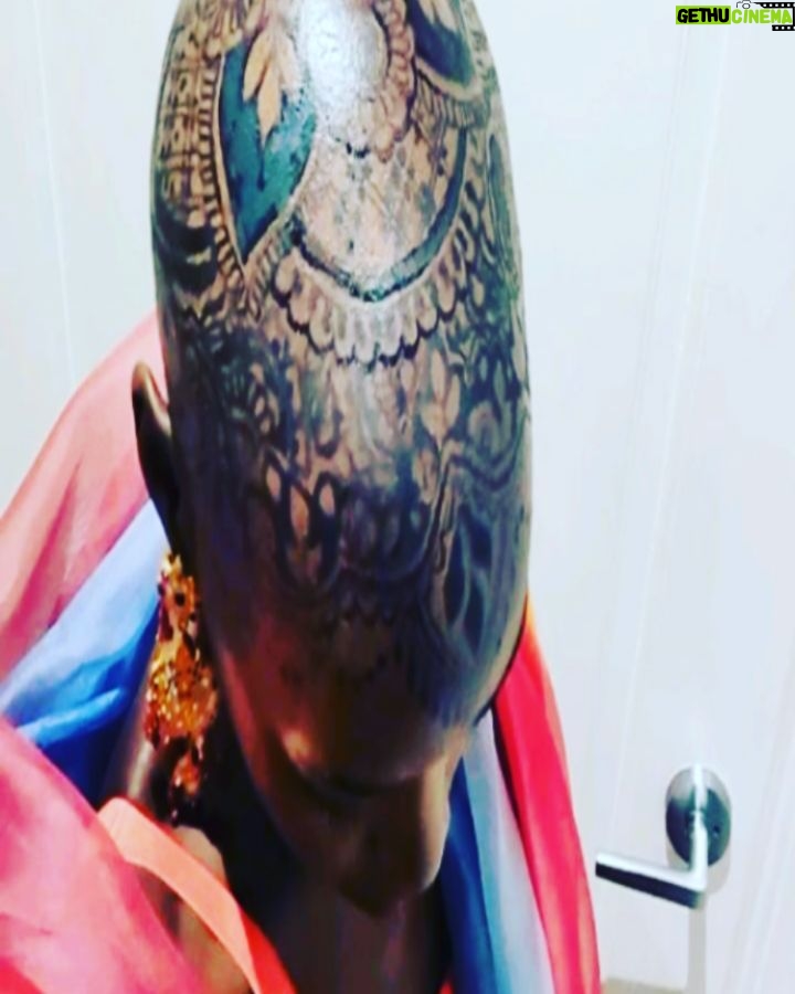 Lupita Nyong'o Instagram - THE STORY OF MY HEAD: I met @hennabysabeen last year at a wedding in Pakistan. She did the #HennaDesign for the bride and I was ASTOUNDED by the INTRICACY and BEAUTY of her work. There was something unique about the way she expressed herself in henna art. And I promised myself, "One day I will have a reason to work with Sabeen." : 1.5 years later, when I got the invitation to attend the opening night of my dear friend, Mira Nair's @monsoonmusical, I was scrambling at the last minute to find something to wear. I borrowed a sari and jewelry from @mishajapanwala, the bride from Pakistan, but the look didn't feel complete... : And then, in the middle of the night, an image SHOT into my mind of a henna design covering my bald head!!! I could do something special and different, to celebrate the culture using the canvas readily available to me! I was so excited by the idea that I could not go back to sleep. Misha connected me to Sabeen, and we were ON OUR WAY... : Sabeen had NEVER designed for a head before; I had never done such a thing before either. My only prompt to her was that I wanted a widow's peak (homage to the bindhi, borla / maang tikka), the rest was ALL HER INNOVATION. She suggested #jagua, a natural dye from the jagua fruit of South America that would be dark enough to give good contrast to my dark skin ☺️. : We were both excited and terrified. What if it went wrong or looked funny??? Well, I thought, I can always wear a head wrap.... : But Sabeen BROUGHT IT! We stopped now and again so that I could give her feedback because she was DETERMINED to leave me a happy client. And Sabeen was METICULOUS. She did not stop until it was perfect. When we looked at the finished head... we were both GRINNING! : It takes about 24 hours for the dye to really show up. And when it came in, in FULL CONTRAST the next day, I was simply MOVED. It was beautiful. It was bold and elegant; it had a point of view. We had not played it safe, and it had paid off. And I had found a new way to express myself without hair! : So the moral of this story is: DARE YOURSELF TO SEEK OUT BEAUTY IN NEW WAYS. And, Sabeen, thank you for bestowing on me the beauty of your hand and history!