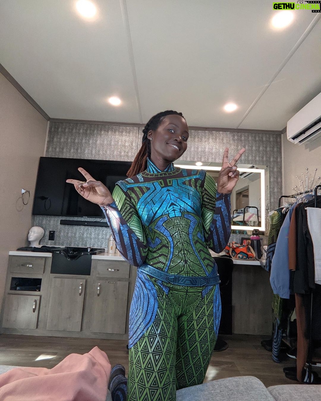 Lupita Nyong'o Instagram - Suited up for 2023! 💚💙 #BlackPanther #WakandaForever