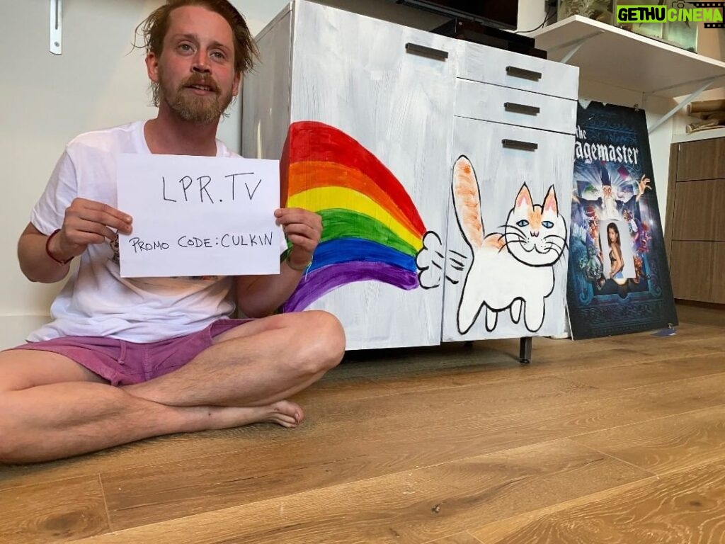 Macaulay Culkin Instagram - Hey dorks, You’re probably asking yourself a lot of questions about this picture. 1. Is that a cat farting rainbows on your cabinet? 2. Is that a picture of your girlfriend where your face should be on that Pagemaster poster? 3. Is that a tarantula in your aquarium? The answer to those are: 1. Yes. I did it myself. 2. Yup. She’s only okay with it. 3. Of course not, tarantulas don’t live in aquariums, they live in terrariums, dumbass. But what you really should be looking at is lpr.tv They’re a platform that brings you performances from tons of cool bands and artists, like @JDbeckmusic @Kimbramusic @emonight_bk @toomanyzooz @chkchkchk_og @therealgza @sunflowerbean @Chrisgeth @kevinpdevine @sonlittlemusic @domi_keys @cultscultscults and a whole bunch more. LPR is a small, independent venue based out of NYC that is close to my heart. It’s a place that always has great bands, drinks, and art all year ‘round. But like many small businesses they’ve been hit hard by our current times and are doing what they can to bring you awesome content despite our current climate. This isn’t a paid advertisement or anything, I just love this place, these people, and what they do and they were dumb enough to give me a promo code. So go to LPR.tv and use the promo code CULKIN and get 25% off (!!!) the subscription fee and check out some great shows without have to wear pants. Heck, I might even do a show myself. You never know. Live the dream. @lprnyc @lpr.tv @btab1 @davidhandlermusic