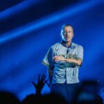 Macklemore Instagram – This tour I have fallen back in love with American venues.  I had forgotten.  They are sacred spaces that hold energy, stories, secrets, sweat, stained walls, beer riddled floors and stages that have been graced by giants who have come and gone.  They are a gathering mecca for the medicine that is music and the magic that occurs in community.  Speakers strapped to the ceiling over the heads of humans pressed up against each other screaming the words in unison.  It has been life affirming to reconnect to this love.  And when I think of venues in America one of my all time favorites is The Rave/Eagles Club in Milwaukee.  It is perfect.  In stature it is a 200,000 sq ft labyrinth, woven in tapestry’s, hidden hallways, lava lamps, a swimming pool, basketball court, an old bowling alley that was converted to a smaller venue and of course the main room.  There is no air conditioning.  It is way too hot.  It is a place where performers will be tested as will the audience, and I revel in the challenge.  The venue is almost 100 years old and is independently owned.  Every time I play there I look forward to hearing stories from the owner Leslie who refuses to sell the place to the bigger companies that have attempted to buy it.  She is a legend, a friend and a magnificent tour guide of the sprawling oasis.  The swimming pool is decorated in graffiti from all the musicians that have stepped foot on this holy ground.  I feel my brother Mac’s spirit in this space, as his eerily beautiful words sit beneath the 25 marker of the pool.  It is truly a 1 of 1 and makes me proud that my fingerprints are part of its linage.  This show marked my 3rd time there and also my 3rd time selling it out.  We gave it 100% as always…It just means something more in Milwaukee ❤️ Milwaukee, Wisconsin