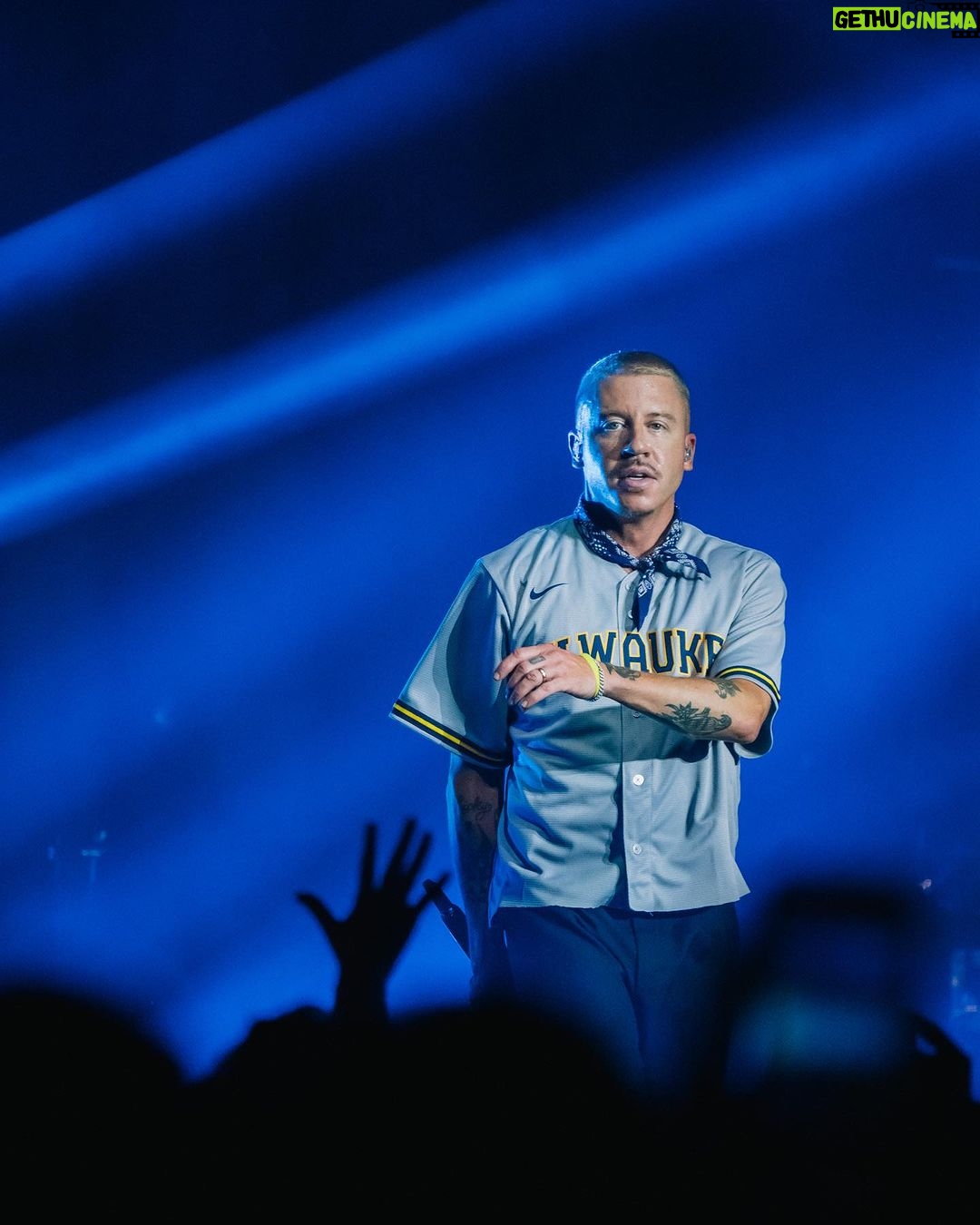 Macklemore Instagram - This tour I have fallen back in love with American venues. I had forgotten. They are sacred spaces that hold energy, stories, secrets, sweat, stained walls, beer riddled floors and stages that have been graced by giants who have come and gone. They are a gathering mecca for the medicine that is music and the magic that occurs in community. Speakers strapped to the ceiling over the heads of humans pressed up against each other screaming the words in unison. It has been life affirming to reconnect to this love. And when I think of venues in America one of my all time favorites is The Rave/Eagles Club in Milwaukee. It is perfect. In stature it is a 200,000 sq ft labyrinth, woven in tapestry’s, hidden hallways, lava lamps, a swimming pool, basketball court, an old bowling alley that was converted to a smaller venue and of course the main room. There is no air conditioning. It is way too hot. It is a place where performers will be tested as will the audience, and I revel in the challenge. The venue is almost 100 years old and is independently owned. Every time I play there I look forward to hearing stories from the owner Leslie who refuses to sell the place to the bigger companies that have attempted to buy it. She is a legend, a friend and a magnificent tour guide of the sprawling oasis. The swimming pool is decorated in graffiti from all the musicians that have stepped foot on this holy ground. I feel my brother Mac’s spirit in this space, as his eerily beautiful words sit beneath the 25 marker of the pool. It is truly a 1 of 1 and makes me proud that my fingerprints are part of its linage. This show marked my 3rd time there and also my 3rd time selling it out. We gave it 100% as always…It just means something more in Milwaukee ❤️ Milwaukee, Wisconsin