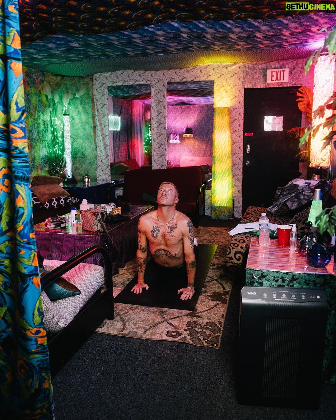 Macklemore Instagram - This tour I have fallen back in love with American venues. I had forgotten. They are sacred spaces that hold energy, stories, secrets, sweat, stained walls, beer riddled floors and stages that have been graced by giants who have come and gone. They are a gathering mecca for the medicine that is music and the magic that occurs in community. Speakers strapped to the ceiling over the heads of humans pressed up against each other screaming the words in unison. It has been life affirming to reconnect to this love. And when I think of venues in America one of my all time favorites is The Rave/Eagles Club in Milwaukee. It is perfect. In stature it is a 200,000 sq ft labyrinth, woven in tapestry’s, hidden hallways, lava lamps, a swimming pool, basketball court, an old bowling alley that was converted to a smaller venue and of course the main room. There is no air conditioning. It is way too hot. It is a place where performers will be tested as will the audience, and I revel in the challenge. The venue is almost 100 years old and is independently owned. Every time I play there I look forward to hearing stories from the owner Leslie who refuses to sell the place to the bigger companies that have attempted to buy it. She is a legend, a friend and a magnificent tour guide of the sprawling oasis. The swimming pool is decorated in graffiti from all the musicians that have stepped foot on this holy ground. I feel my brother Mac’s spirit in this space, as his eerily beautiful words sit beneath the 25 marker of the pool. It is truly a 1 of 1 and makes me proud that my fingerprints are part of its linage. This show marked my 3rd time there and also my 3rd time selling it out. We gave it 100% as always…It just means something more in Milwaukee ❤️ Milwaukee, Wisconsin